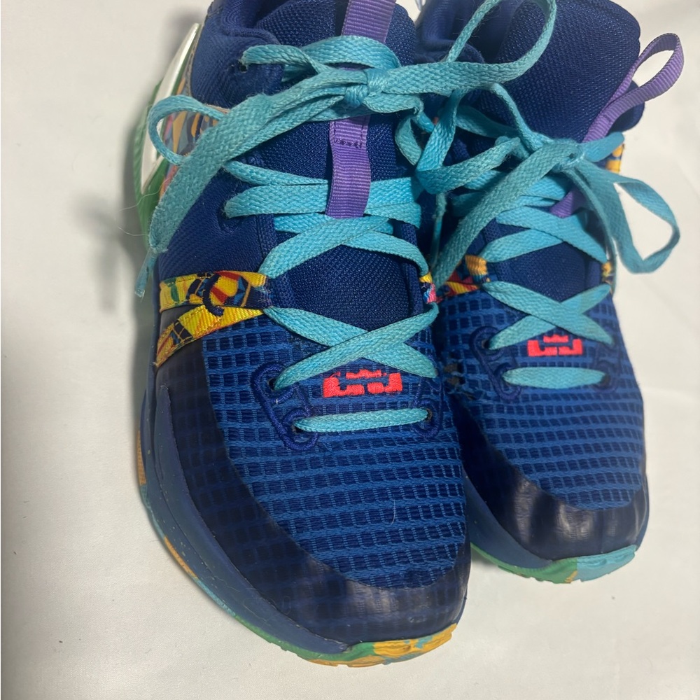 Nike Kids Blue Sneakers with Aqua Laces and Purple Accents
